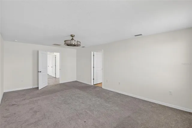 a view of a golf course with a lake