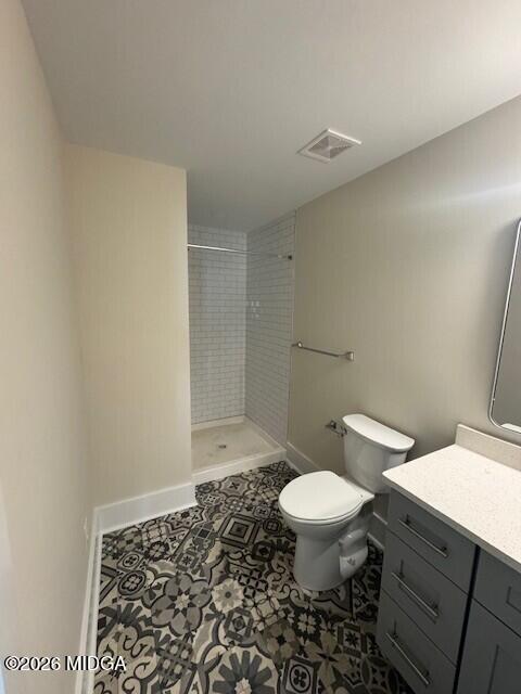 530 2nd Street, Unit B Macon, GA 31201 - Photo 12 of 13 a toilet sitting in a bathroom next to a sink