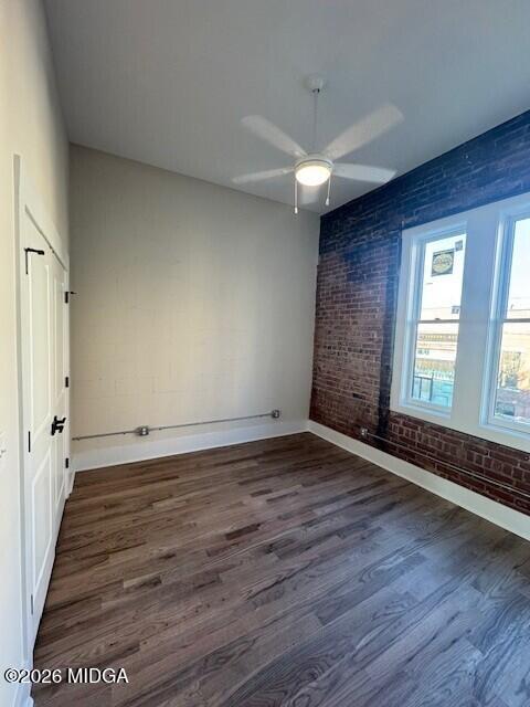 530 2nd Street, Unit B Macon, GA 31201 - Photo 9 of 13 an empty room with wooden floor and windows