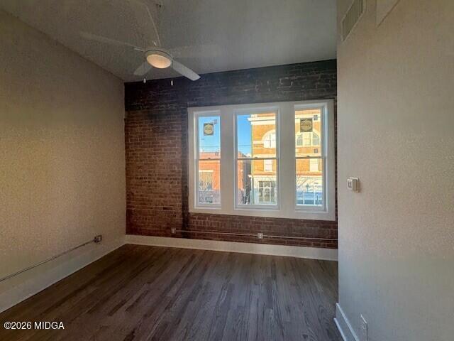 530 2nd Street, Unit B Macon, GA 31201 - Photo 10 of 13 an empty room with wooden floor and windows