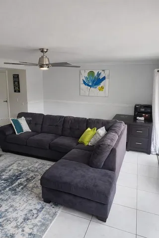 a living room with furniture and a couch