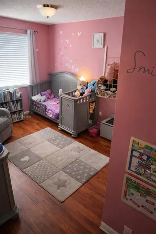 a bedroom with furniture and a bed