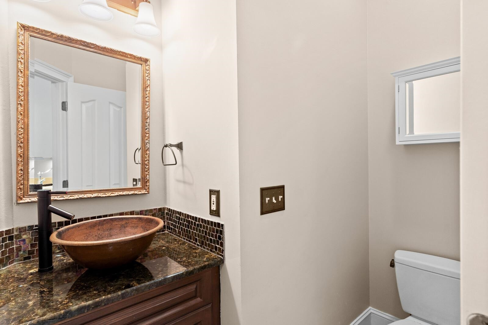 6620 Rest Haven Drive Raleigh, NC 27612 - Photo 19 of 52 Powder room off laundry room