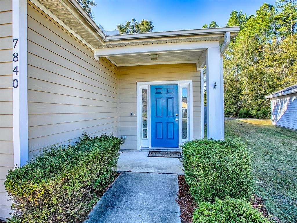 7840 Northwest 21 Way Gainesville, FL 32609 - Photo 2 of 38 a view of entrance door of the house