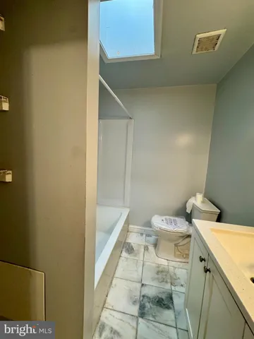 a bathroom with a sink and a toilet