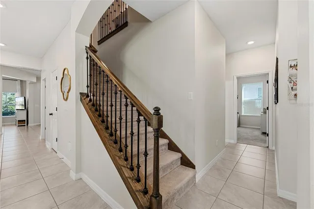 a view of an entryway with wooden floor
