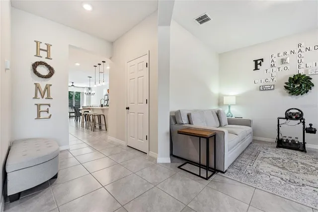a living room with furniture and a table