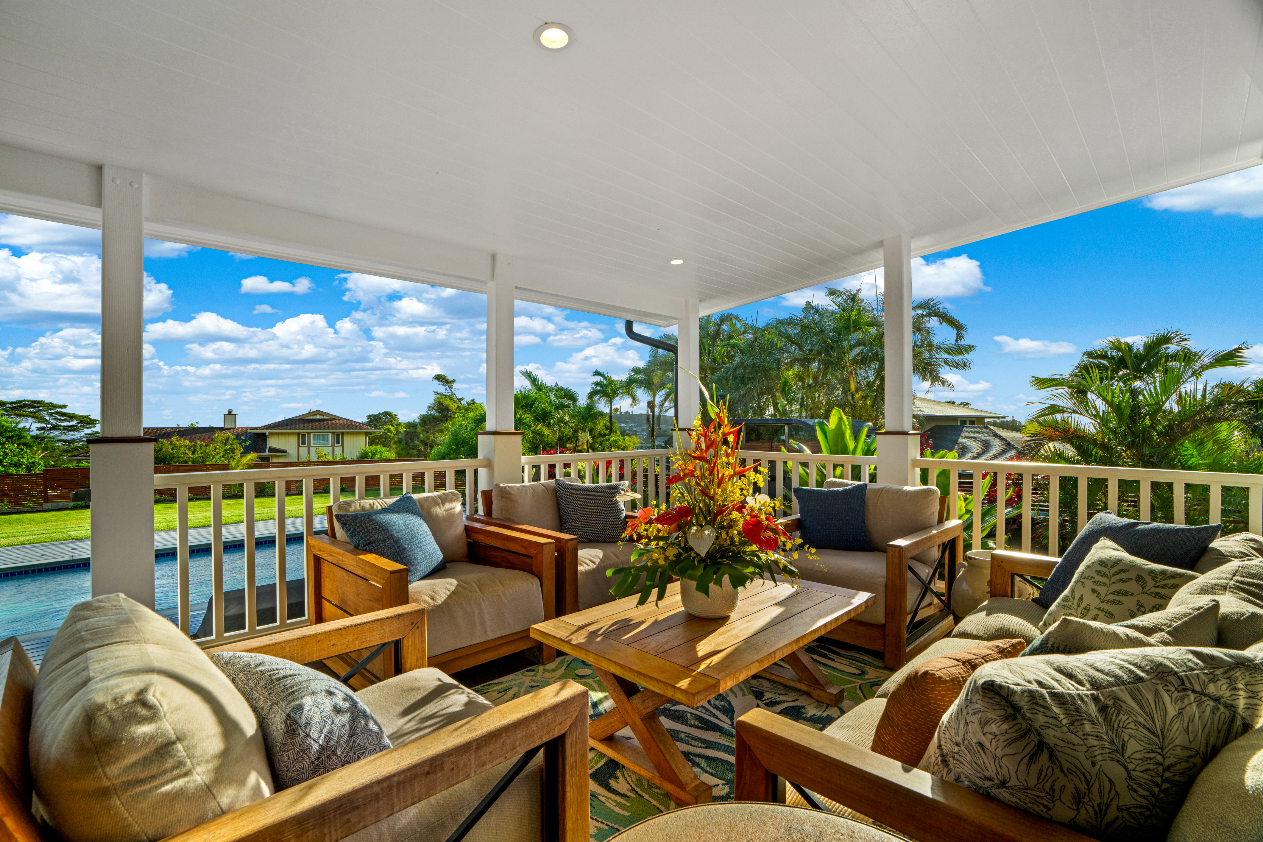 4838 H Puuwai Road, Unit D Kalaheo, HI 96741 - Photo 7 of 25 a terrace with outdoor seating and city view