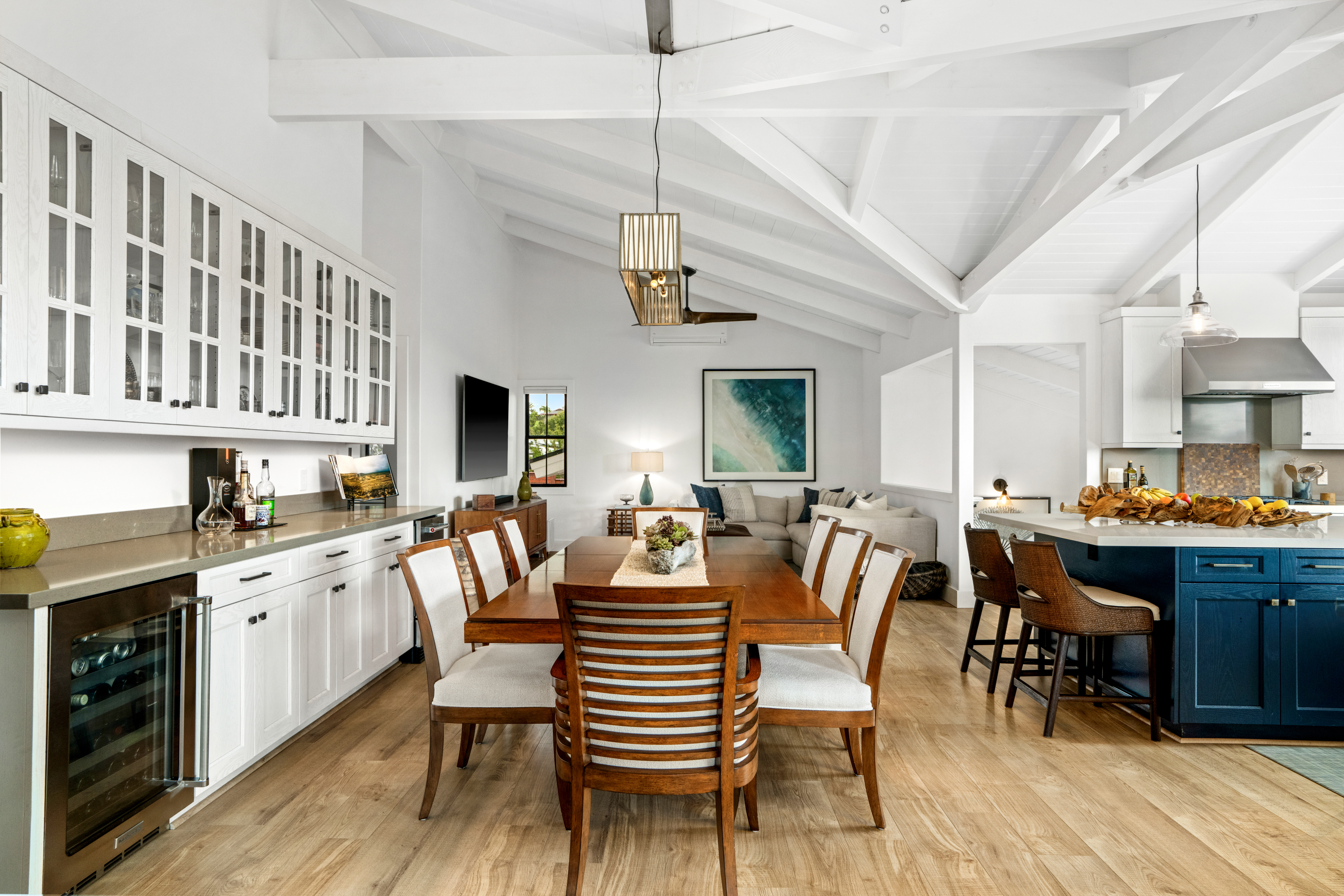 4838 H Puuwai Road, Unit D Kalaheo, HI 96741 - Photo 10 of 25 a view of a dining room with furniture and wooden floor