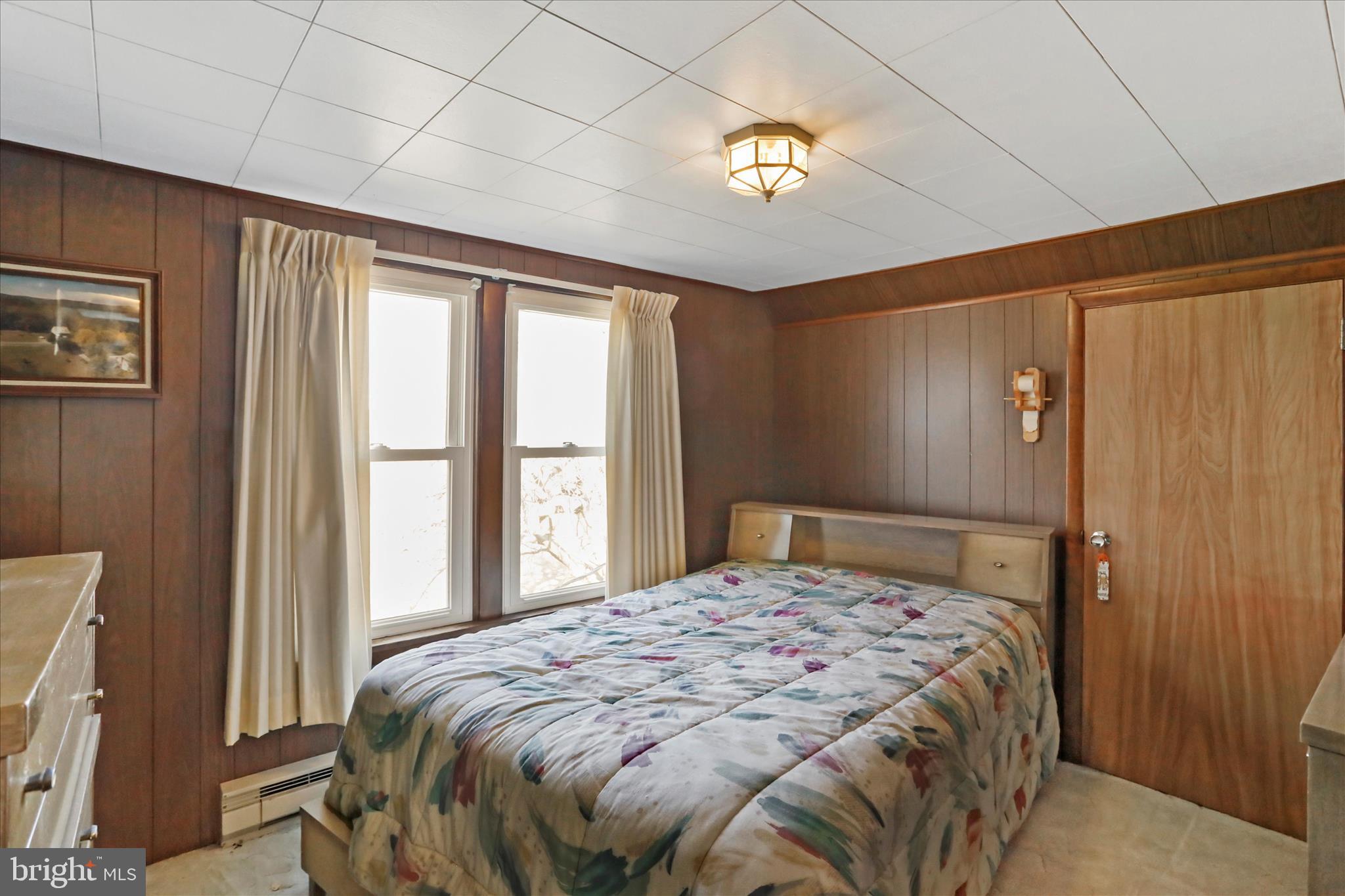 14111 Green Ridge Road Northeast Flintstone, MD 21530 - Photo 18 of 24 a bedroom with a bed and a window