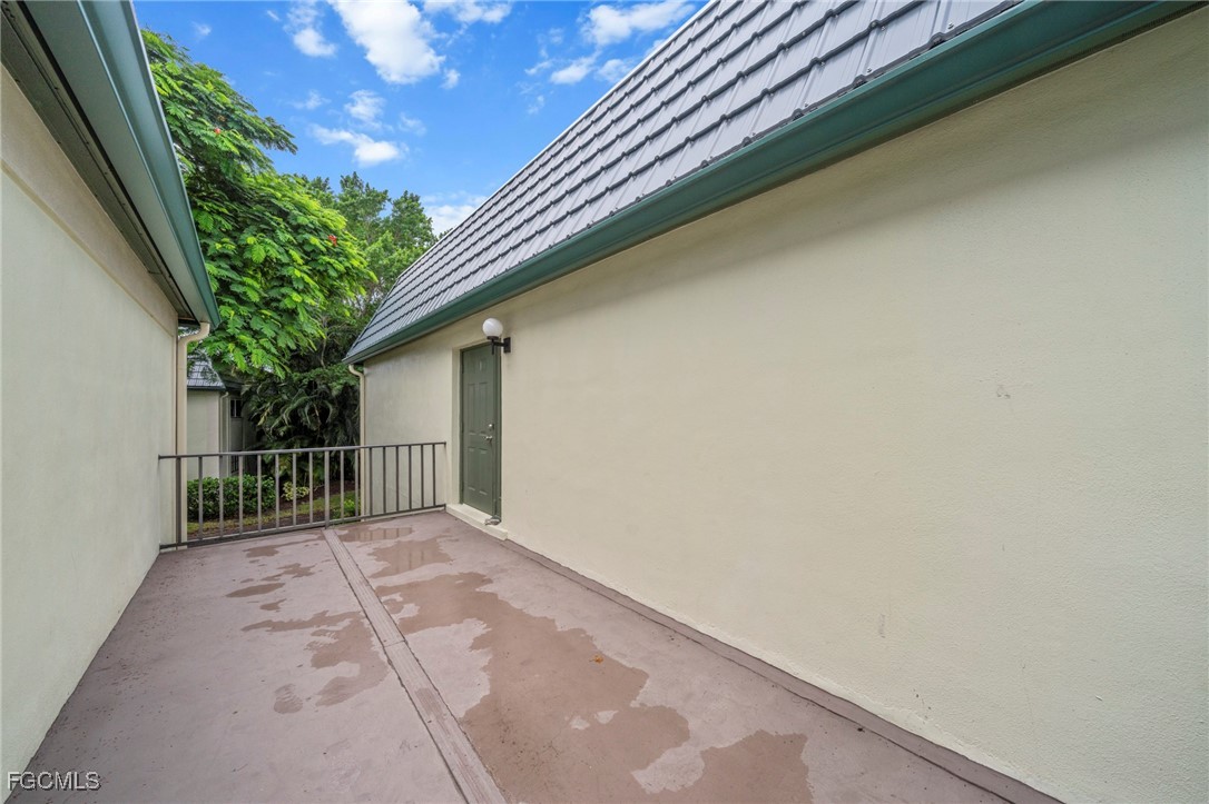 202 Bobolink Way, Unit 202B Naples, FL 34105 - Photo 26 of 31 a view of backyard with green space