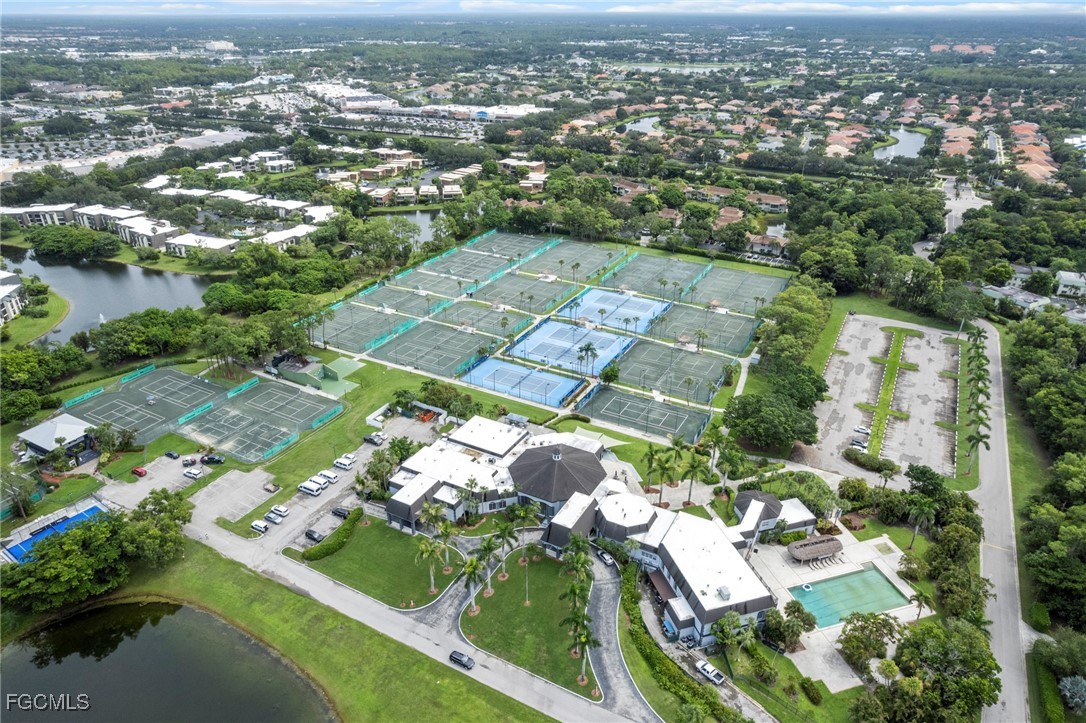 202 Bobolink Way, Unit 202B Naples, FL 34105 - Photo 7 of 31 an aerial view of residential houses with outdoor space