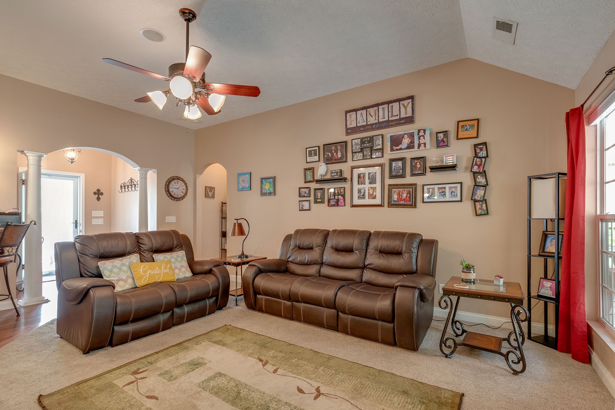 1112 Pee Dee Branch Road Cottontown, TN 37048 - Photo 11 of 33 a living room with furniture a ceiling fan and a rug