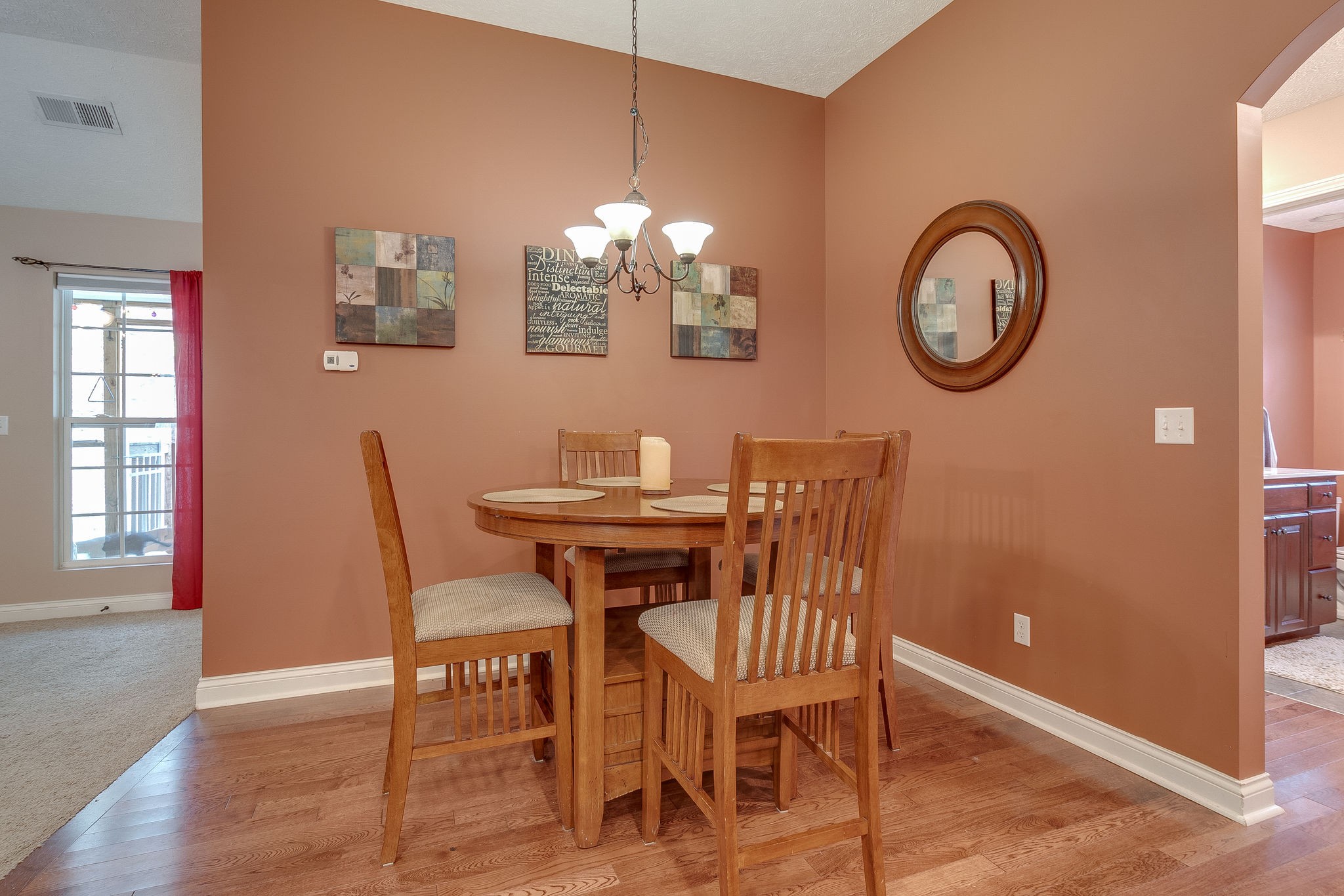 1112 Pee Dee Branch Road Cottontown, TN 37048 - Photo 19 of 33 a view of a dining room with furniture and chandelier