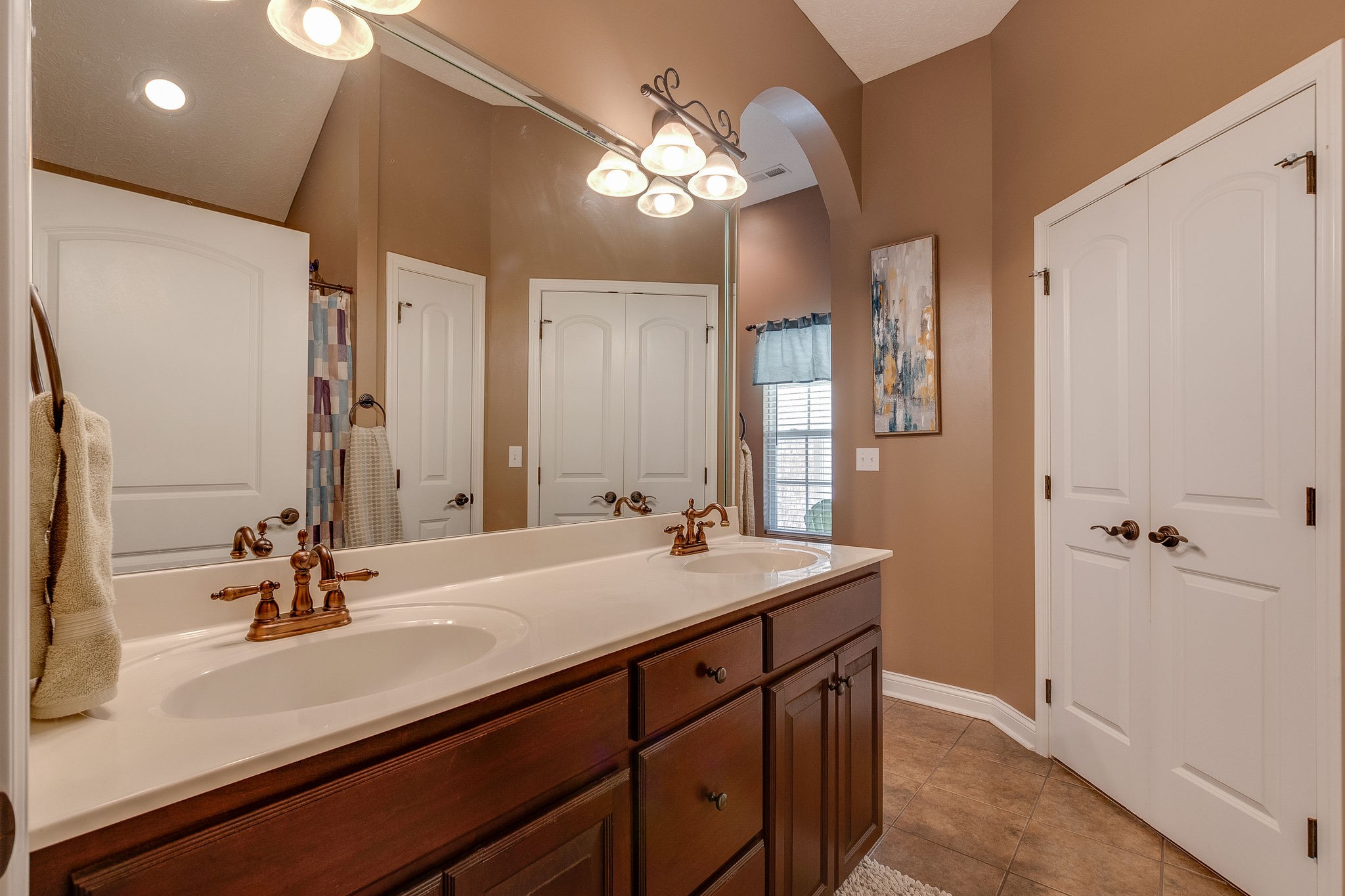 1112 Pee Dee Branch Road Cottontown, TN 37048 - Photo 21 of 33 a bathroom with a sink double vanity granite and a mirror