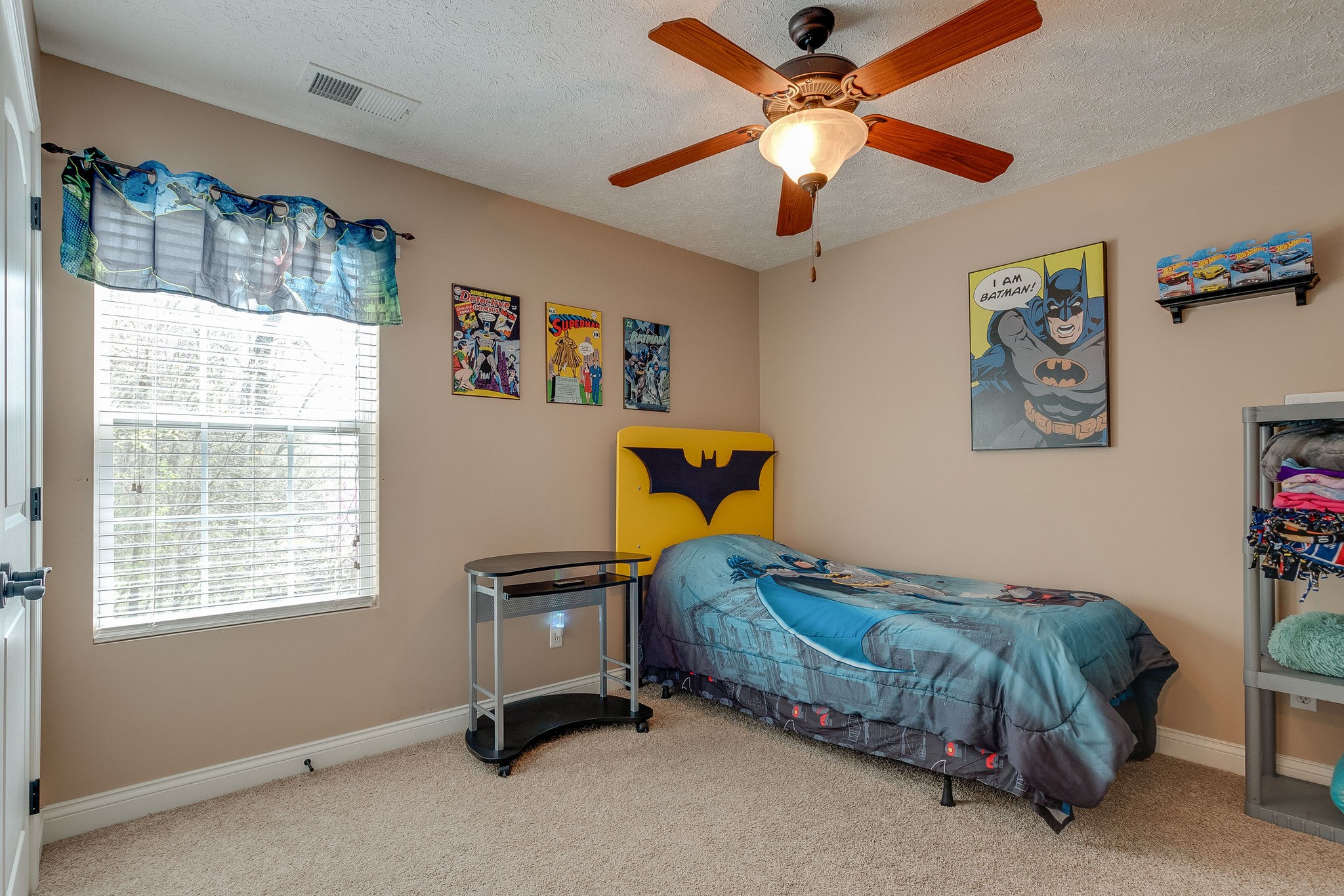 1112 Pee Dee Branch Road Cottontown, TN 37048 - Photo 23 of 33 a bedroom with a bed and a chandelier