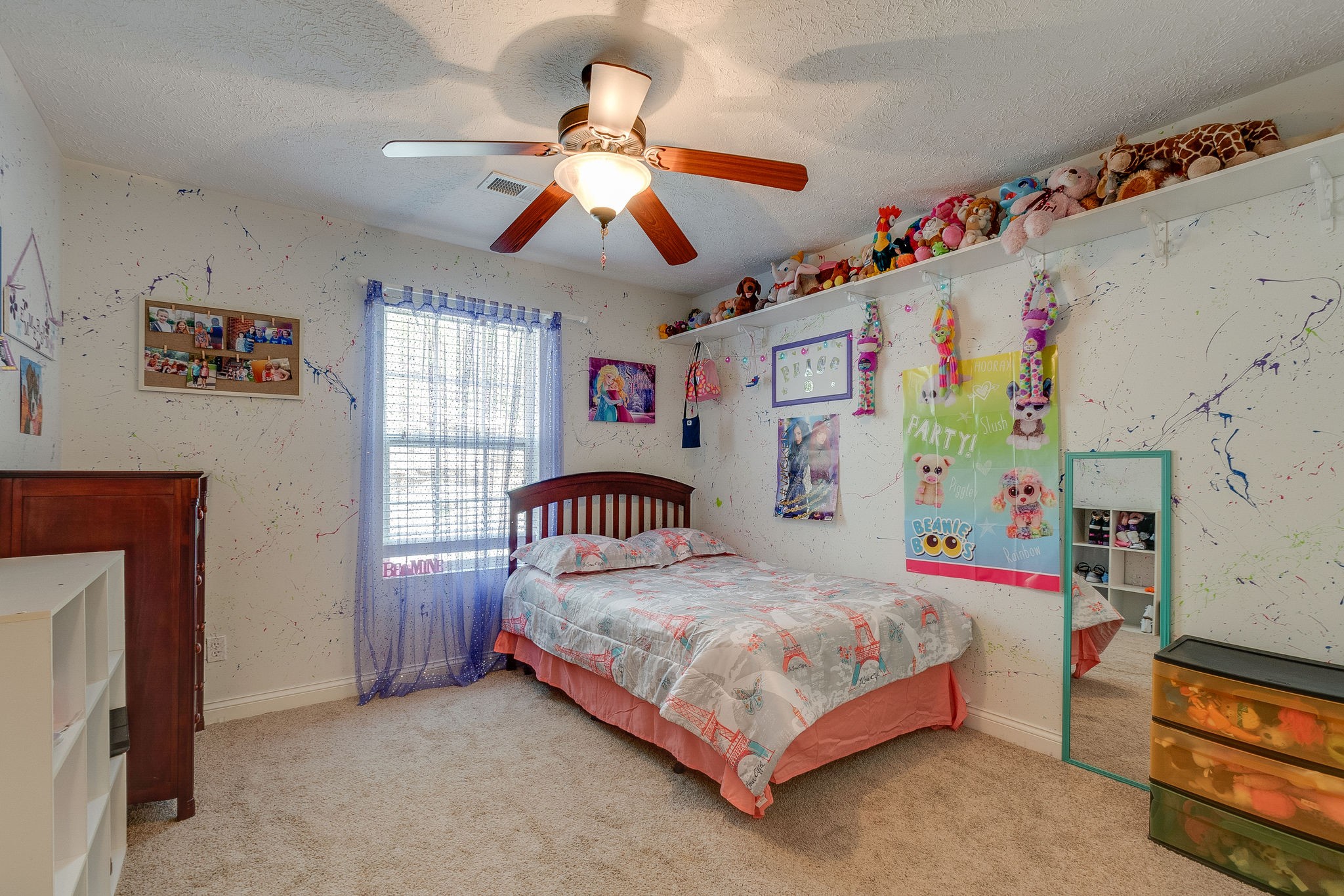 1112 Pee Dee Branch Road Cottontown, TN 37048 - Photo 25 of 33 a bedroom with a bed and a chandelier