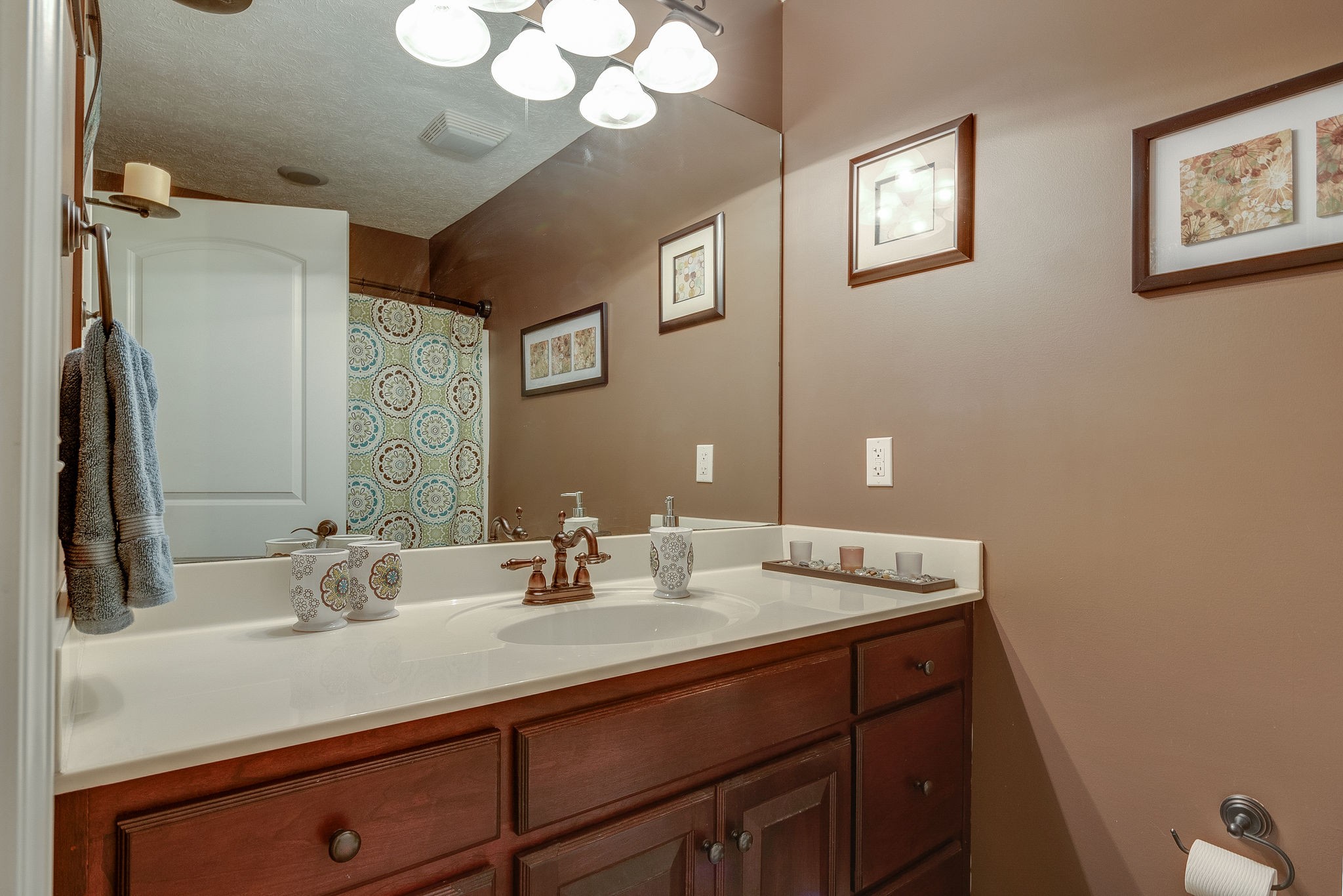 1112 Pee Dee Branch Road Cottontown, TN 37048 - Photo 28 of 33 a bathroom with a sink and a mirror