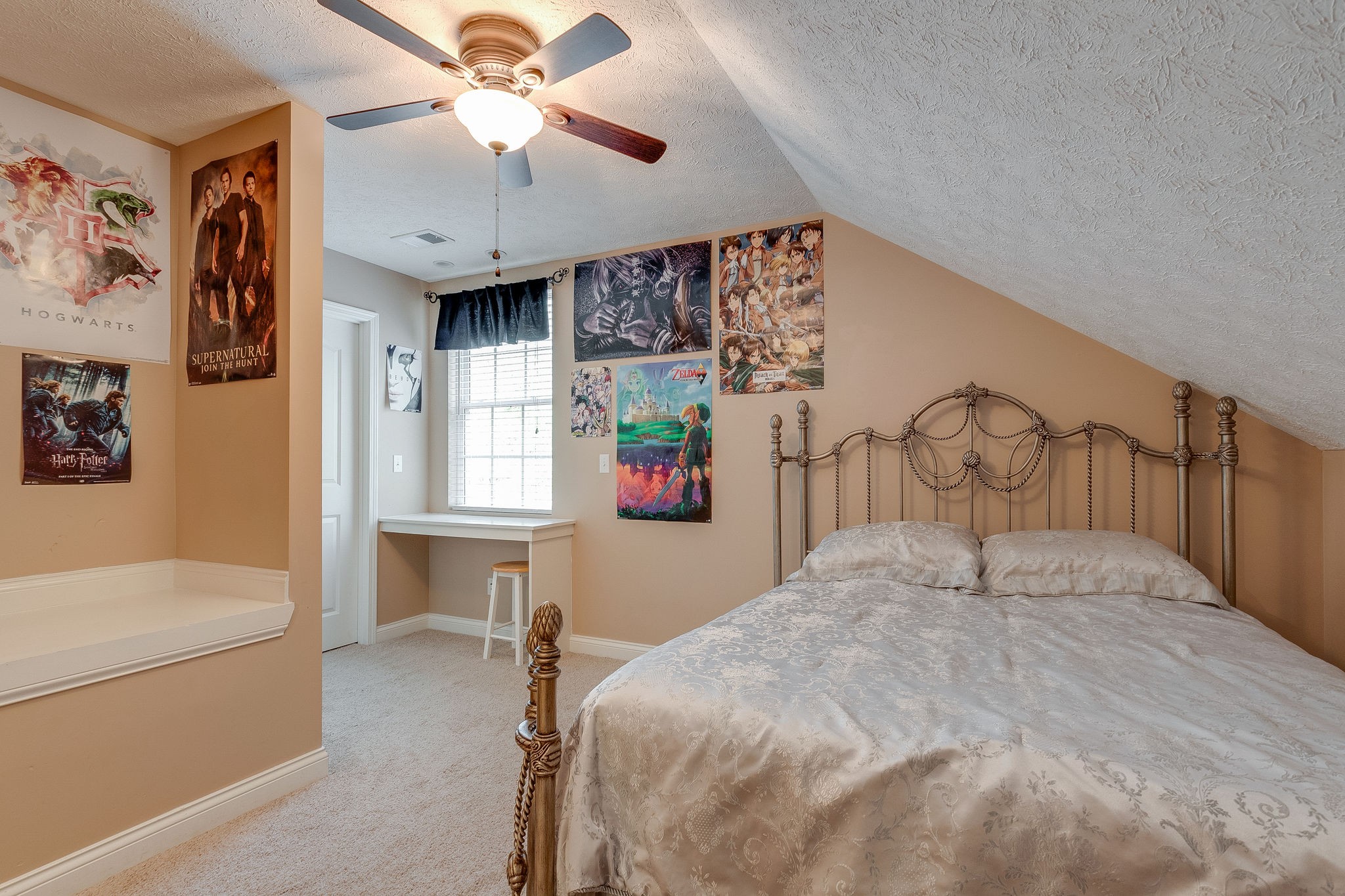1112 Pee Dee Branch Road Cottontown, TN 37048 - Photo 29 of 33 a bedroom with a bed and a chandelier