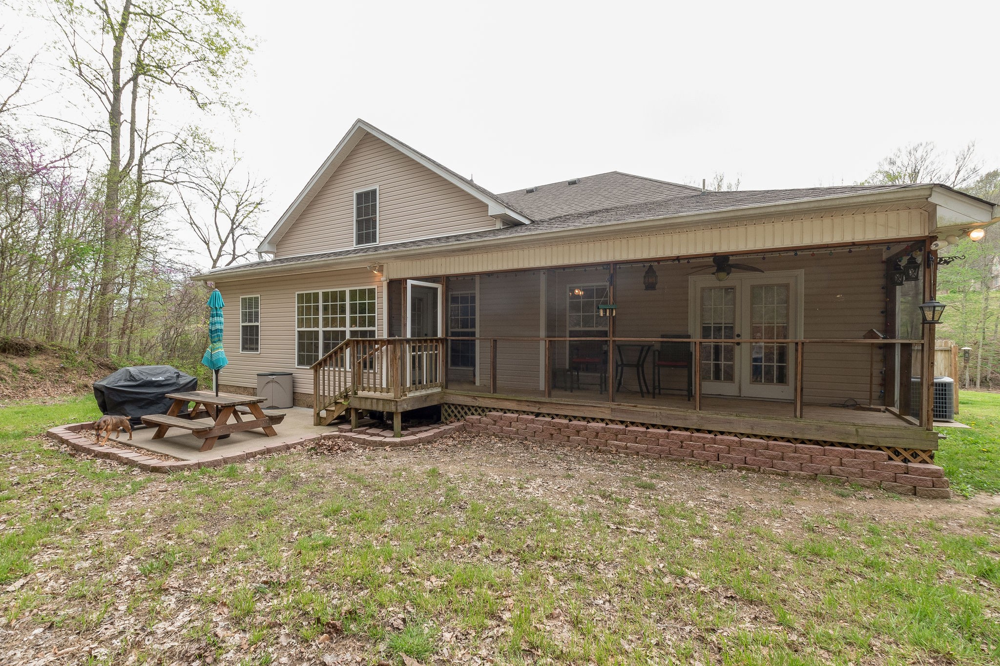 1112 Pee Dee Branch Road Cottontown, TN 37048 - Photo 30 of 33 a view of a house with backyard and porch