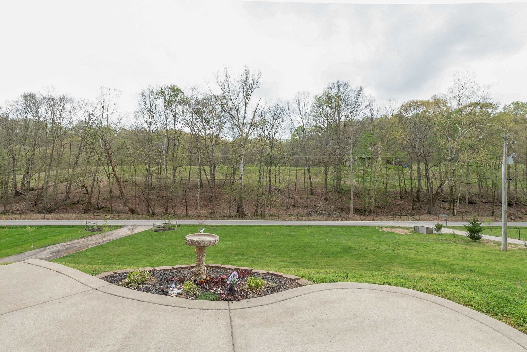 1112 Pee Dee Branch Road Cottontown, TN 37048 - Photo 5 of 33 a swimming pool with trees in the background