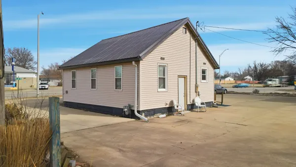 a view of a house with a patio