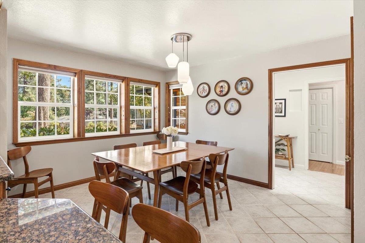 16856 Scott Way Grass Valley, CA 95949 - Photo 19 of 67 a view of a dining room and livingroom with furniture window and wooden floor