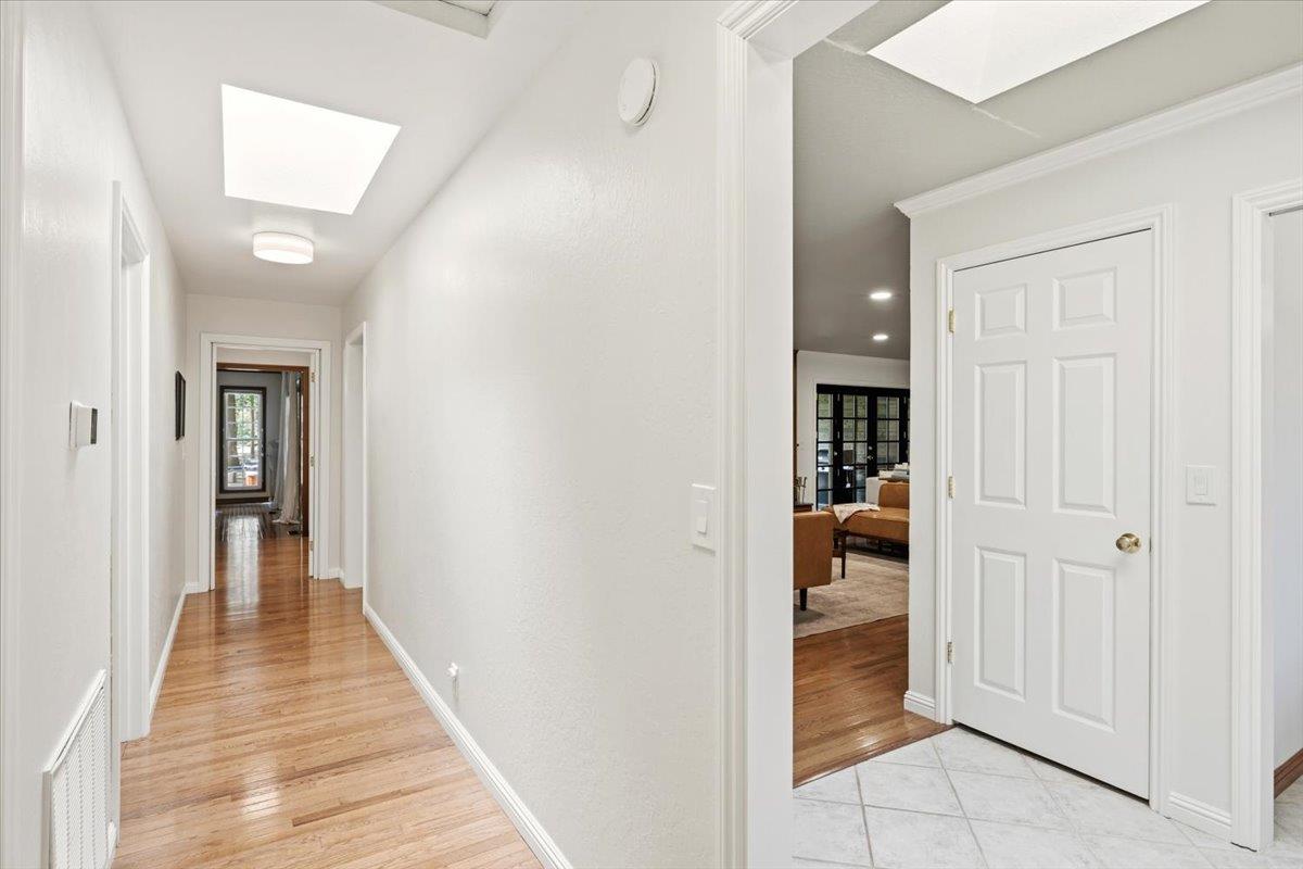 16856 Scott Way Grass Valley, CA 95949 - Photo 20 of 67 a view of a hallway with wooden floor and closet