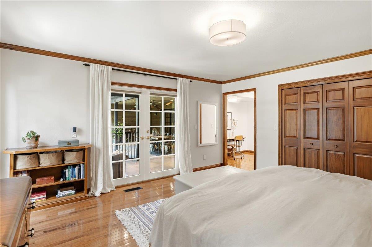 16856 Scott Way Grass Valley, CA 95949 - Photo 22 of 67 a bedroom with a bed and a large window