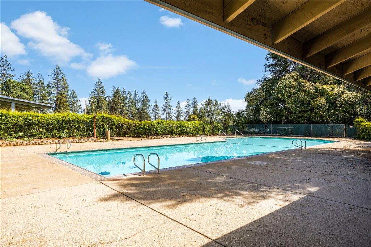 16856 Scott Way Grass Valley, CA 95949 - Photo 54 of 67 a view of a swimming pool with a yard