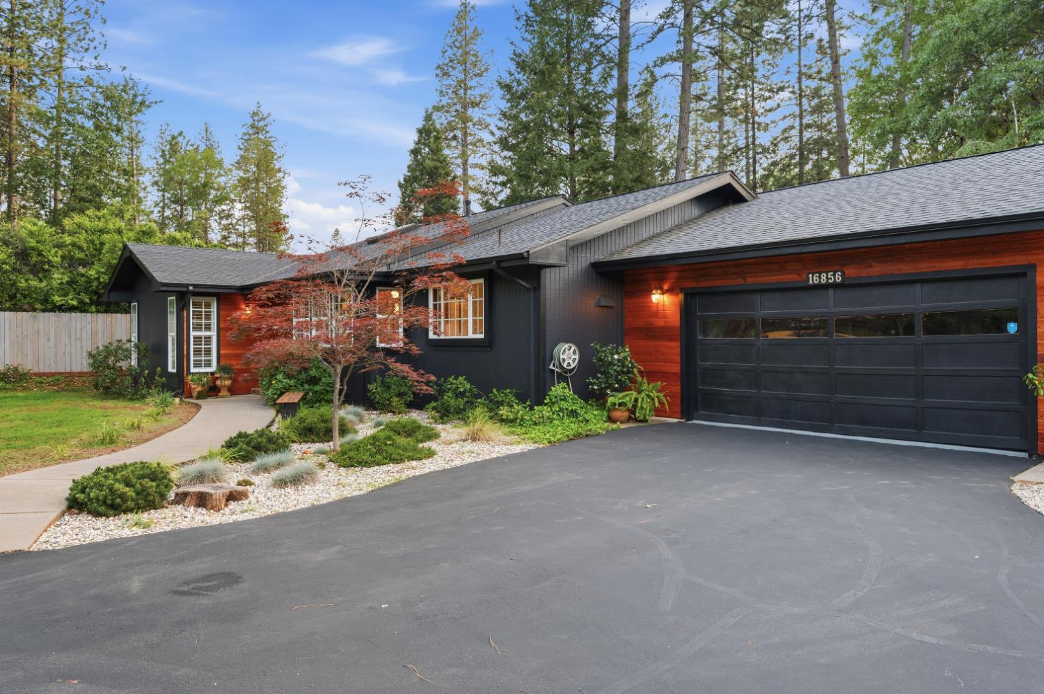 16856 Scott Way Grass Valley, CA 95949 - Photo 62 of 67 a front view of a house with a yard and garage