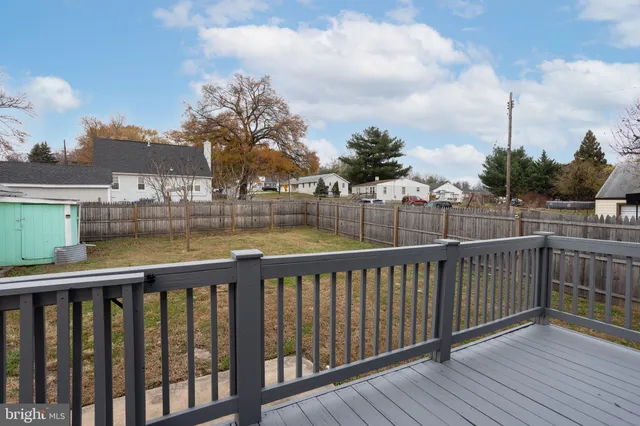 a balcony with wooden floor