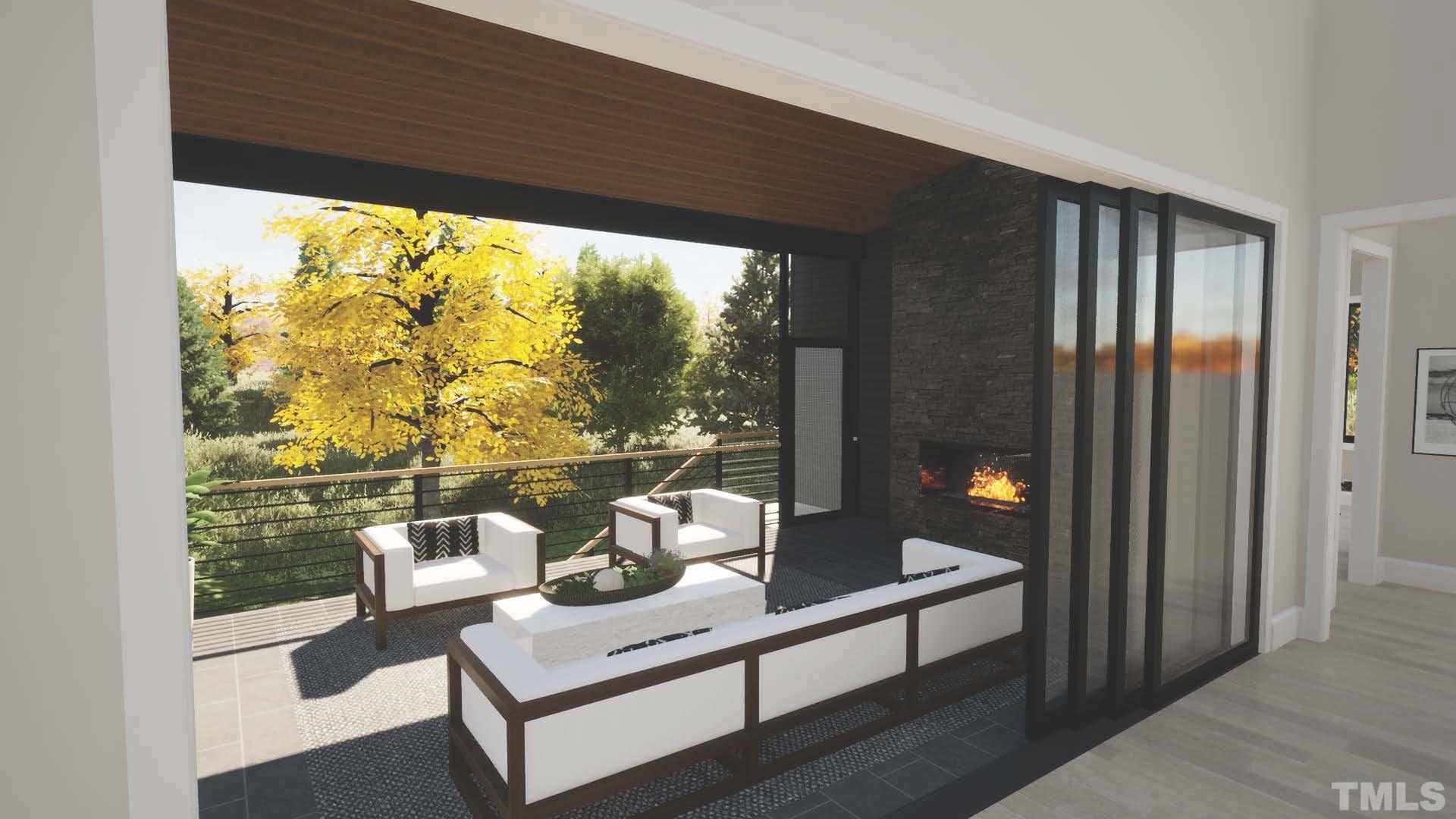 3300 Hampton Road Raleigh, NC 27607 - Photo 27 of 41 a living room with couch and a floor to ceiling window