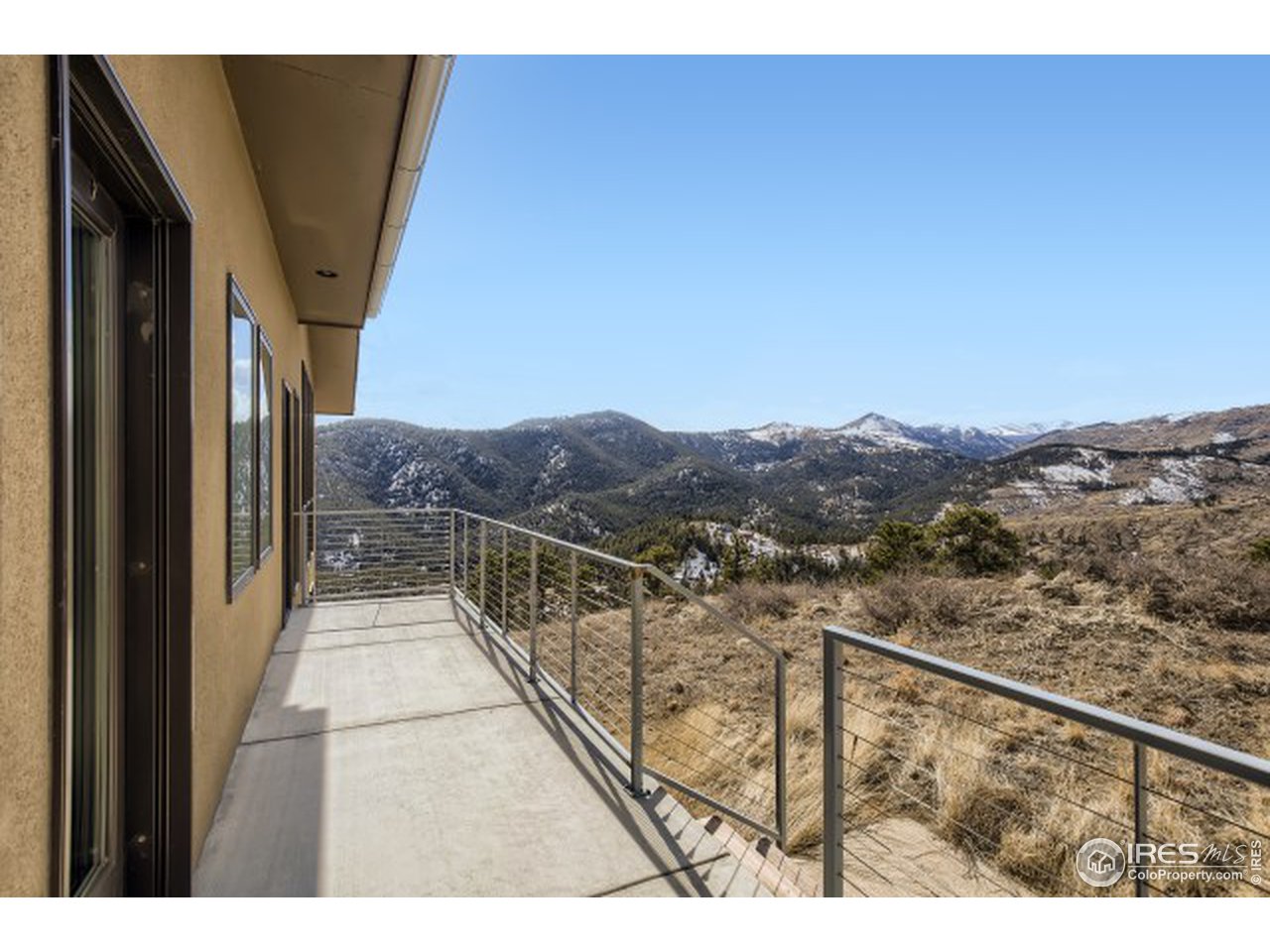 1133 Arroyo Chico Road Boulder, CO 80302 - Photo 32 of 37 a view of a city from a balcony
