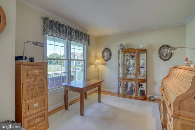 a room with furniture and a window