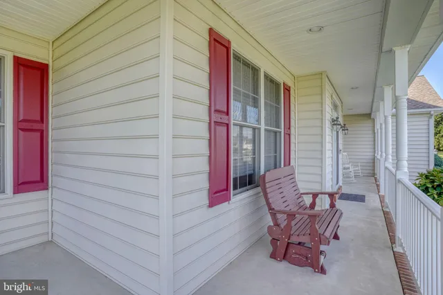 a view of backyard with seating space