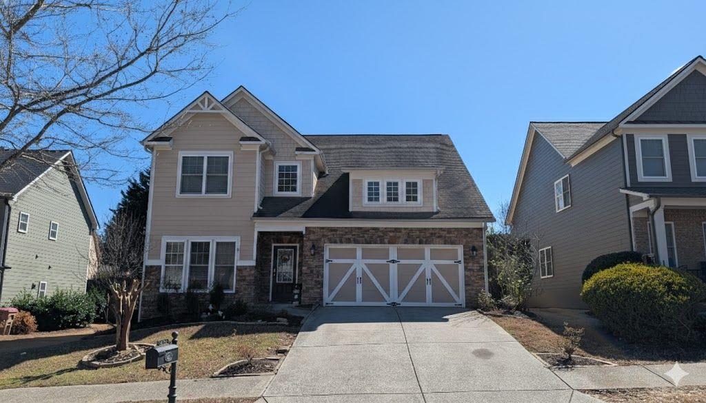 7923 Keepsake Lane Flowery Branch, GA 30542 - Photo 1 of 6 a front view of a house