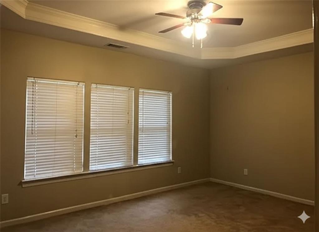 7923 Keepsake Lane Flowery Branch, GA 30542 - Photo 6 of 6 a view of an empty room with a window