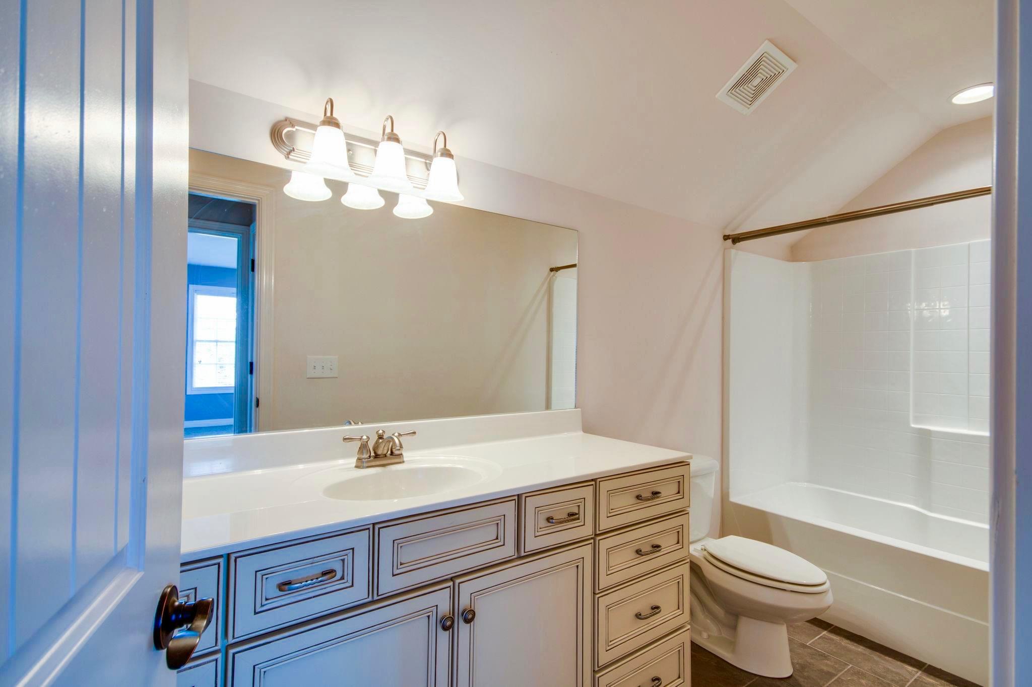 11187 South Windrow Road Rockvale, TN 37153 - Photo 13 of 26 Yes, it has 4 1/2 baths in this home. Her is another full bath.
