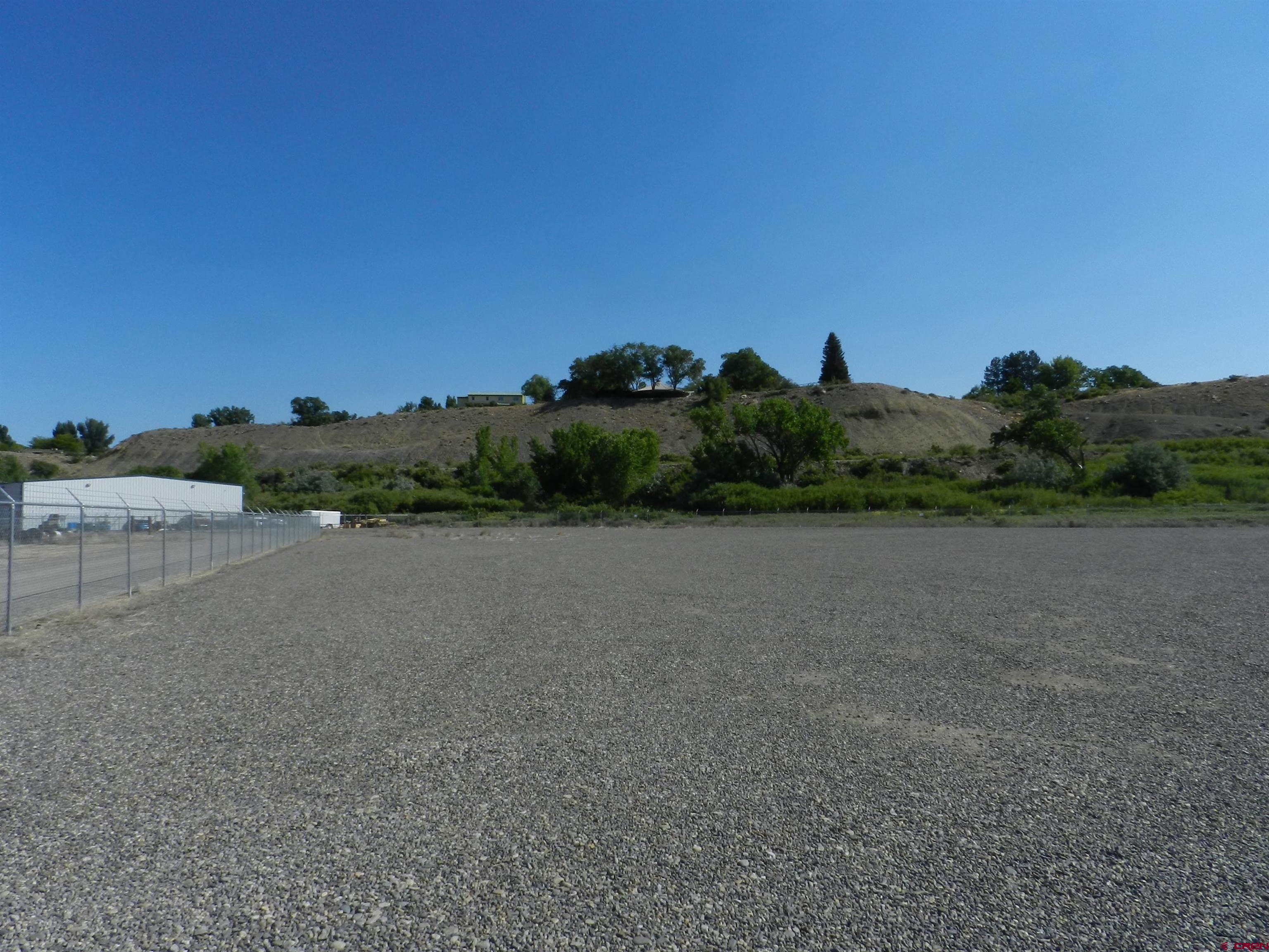 Tbd 6225th Road, Unit LOT LEASE Montrose, CO 81401 - Photo 3 of 14 a view of a field