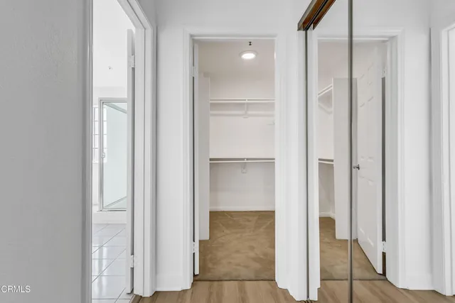 a view of a bathroom with a glass door