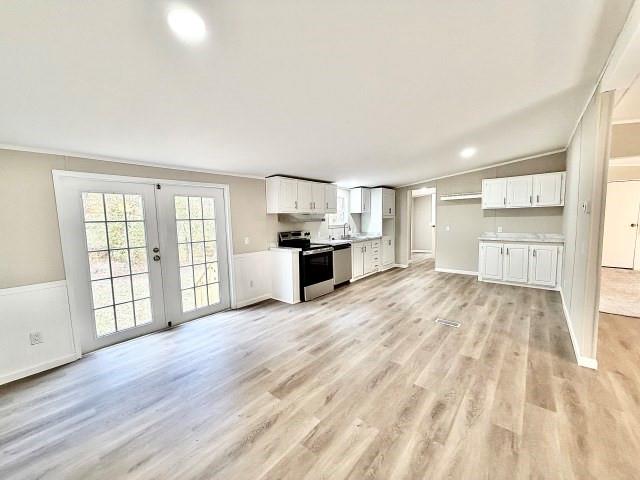 409 Cross Creek Road Longview, TX 75602 - Photo 6 of 14 a view of a kitchen with a sink dishwasher and a fireplace
