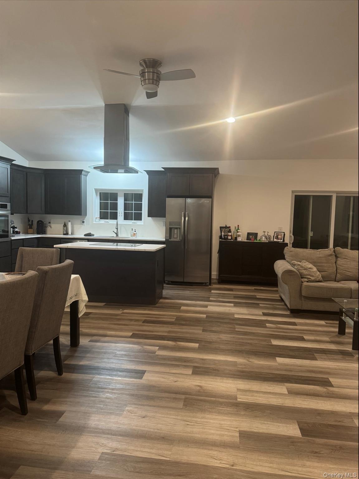 198 Pleasant Ridge Road Poughquag, NY 12570 - Photo 13 of 27 a living room with kitchen furniture and a kitchen view