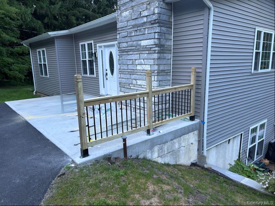 198 Pleasant Ridge Road Poughquag, NY 12570 - Photo 2 of 27 a view of a house with a yard and deck