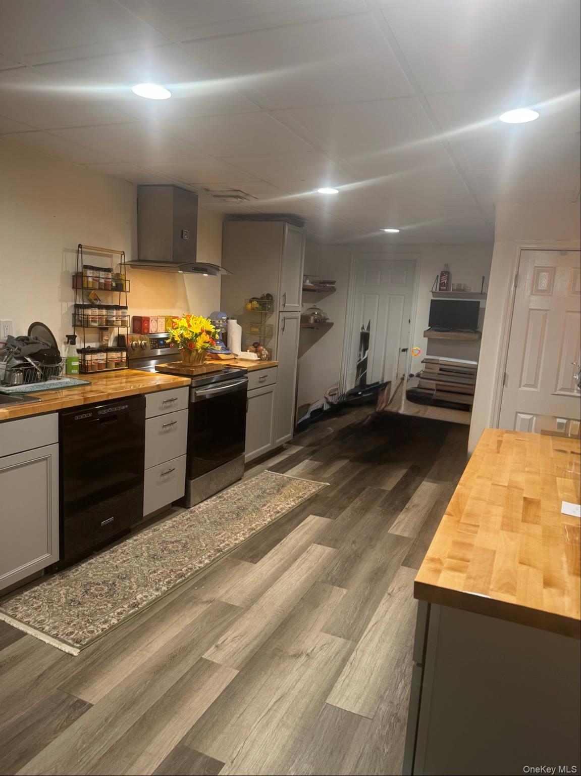198 Pleasant Ridge Road Poughquag, NY 12570 - Photo 23 of 27 a kitchen with stainless steel appliances granite countertop a sink stove and refrigerator