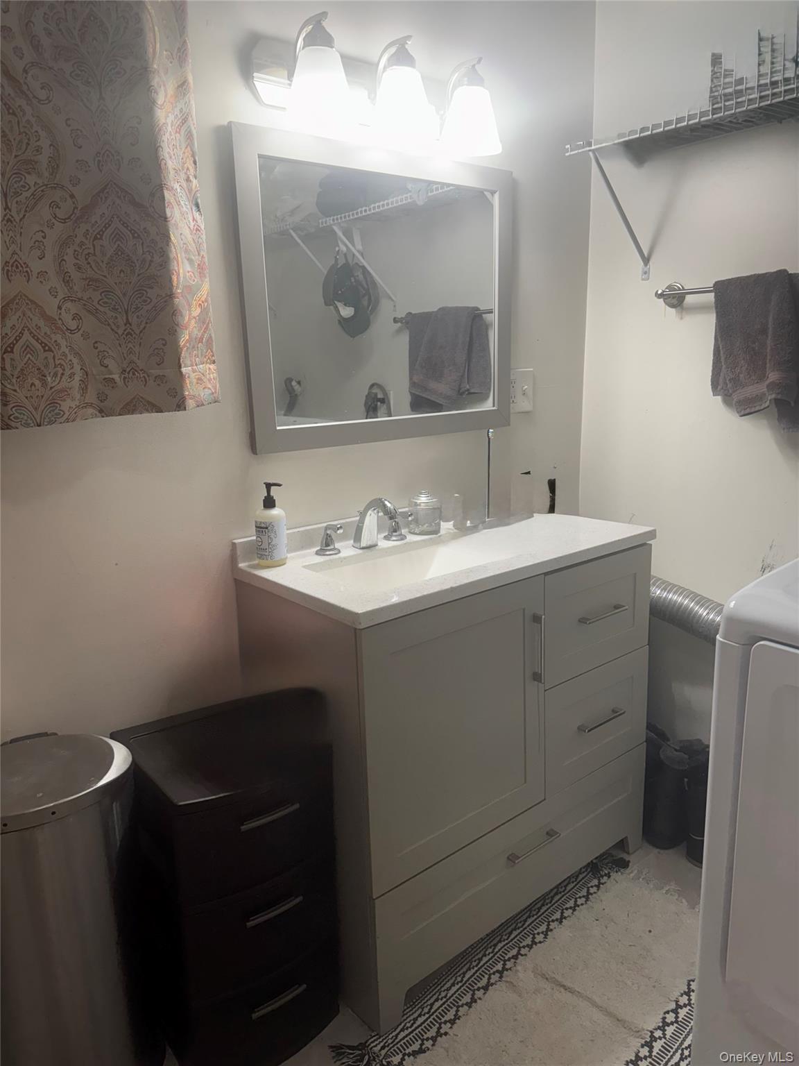198 Pleasant Ridge Road Poughquag, NY 12570 - Photo 27 of 27 a bathroom with a sink toilet and mirror