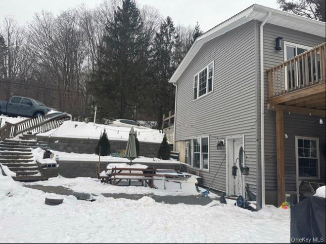 198 Pleasant Ridge Road Poughquag, NY 12570 - Photo 5 of 27 a view of a house with a patio