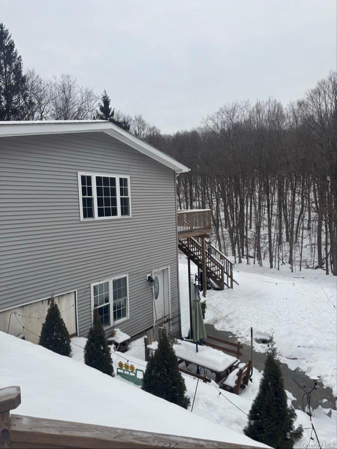 198 Pleasant Ridge Road Poughquag, NY 12570 - Photo 8 of 27 a view of a house with a patio