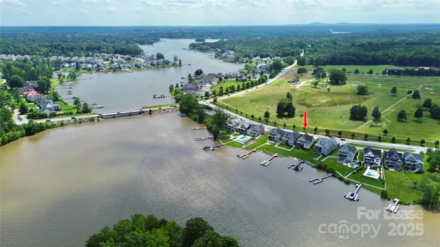 an aerial view of a house with a garden