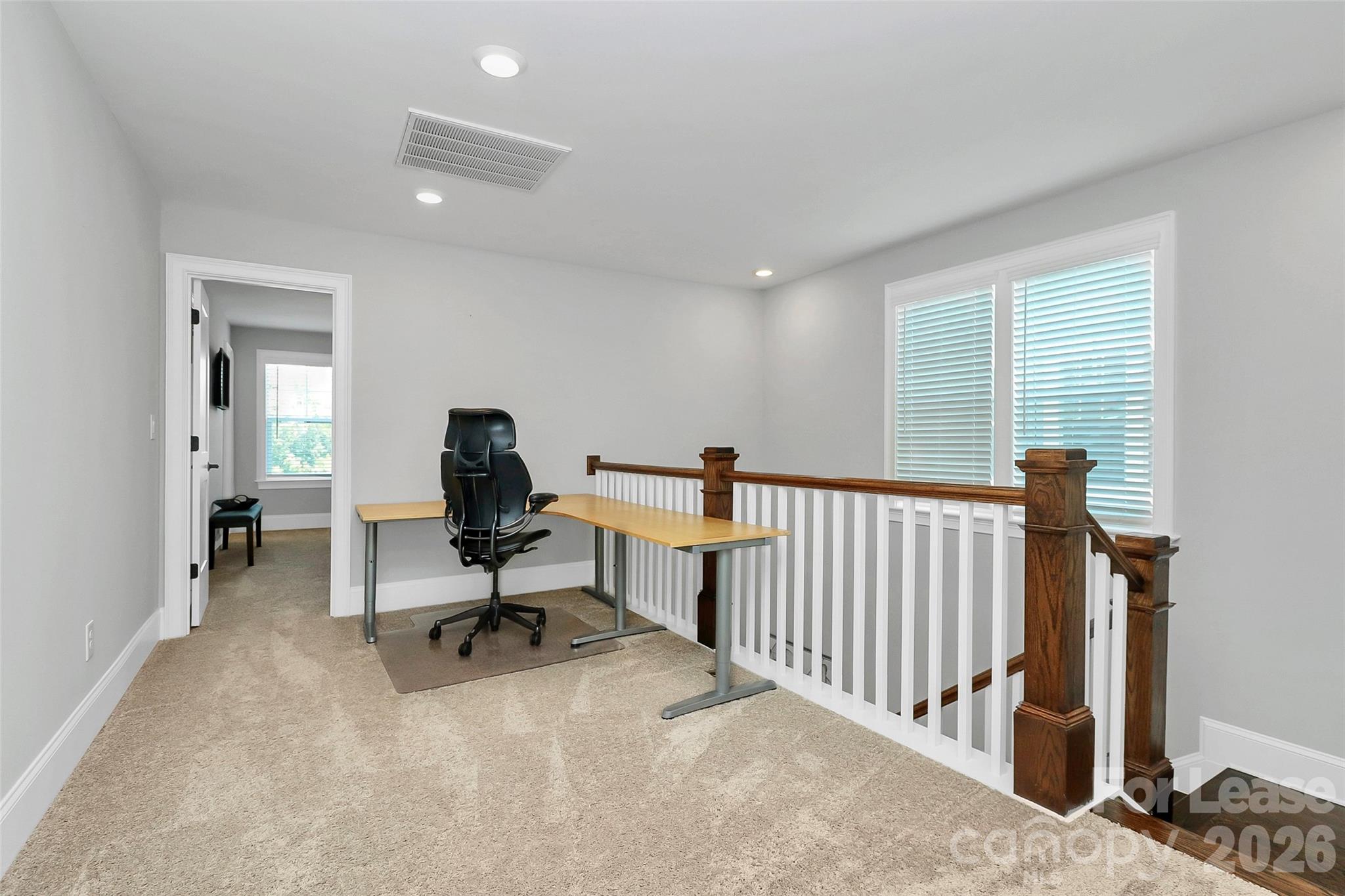 136 Preston Road Mooresville, NC 28117 - Photo 23 of 46 a view of a workspace with furniture and a window
